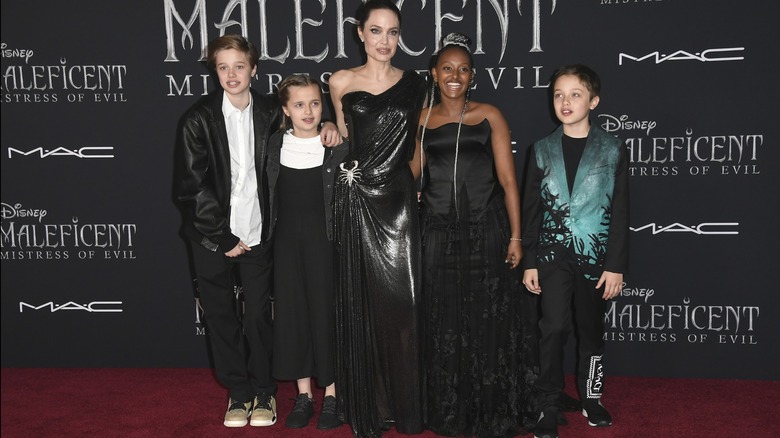 Angelina Jolie posing with her kids