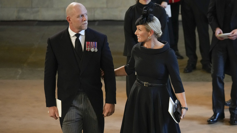 Mike Tindall & Zara Tindall looking somber