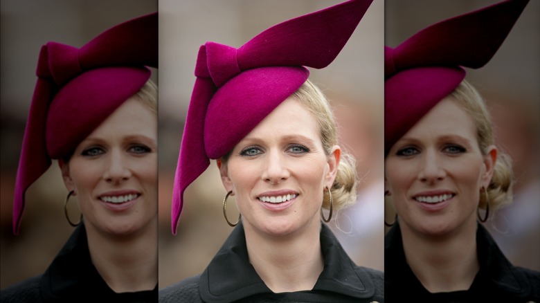 Zara Tindall in plum colored hat 