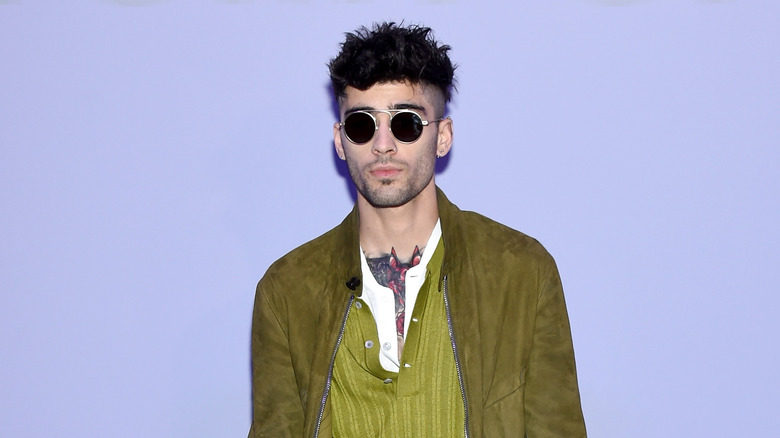 Zayn Malik posing at Tom Ford event