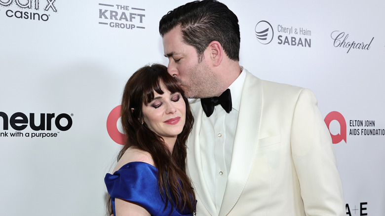 Jonathan Scott kisses Zooey Deschanel on the head