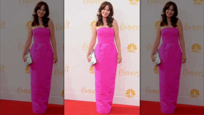 Zooey Deschanel smiling at the 2014 Emmys