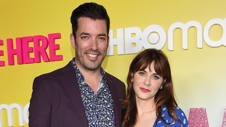 Jonathan Scott and Zooey Deschanel during the "We're Here" Season 2 premiere