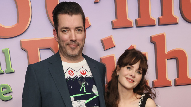 Jonathan Scott and Zooey Deschanel during "The Simpsons" holiday special world premiere