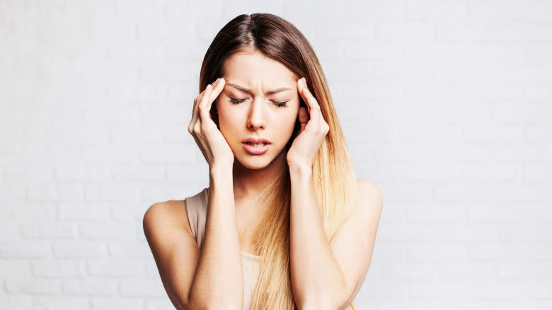 How To Tell The Difference Between A Headache And A Migraine